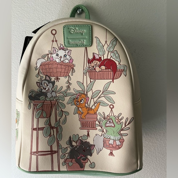 Loungefly Handbags - Loungefly Disney cats Cream Mini Backpack with Pastel Green Trim.